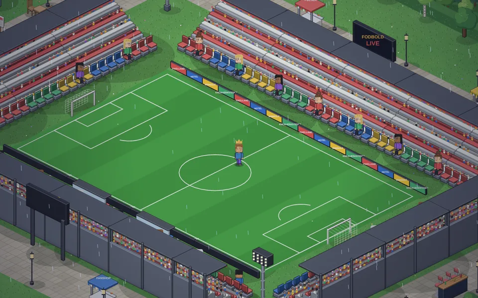 Fodboldstadion i Pixelland med grøn bane, store tribuner fulde af tilskuere, lystårne og storskærm